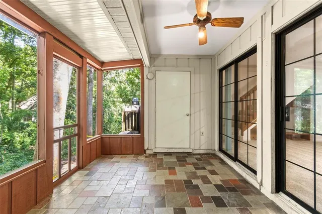 a view of empty room with windows