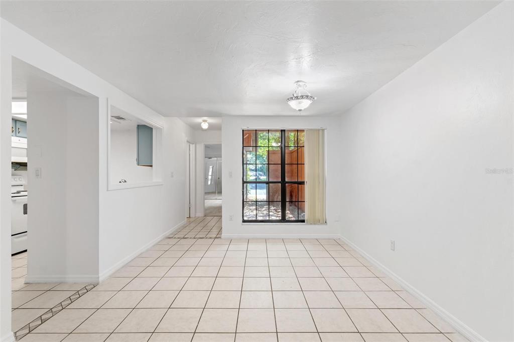 5606 Southwest 8th Place Gainesville, FL 32607 - Photo 5 of 24 a view of an empty room and window