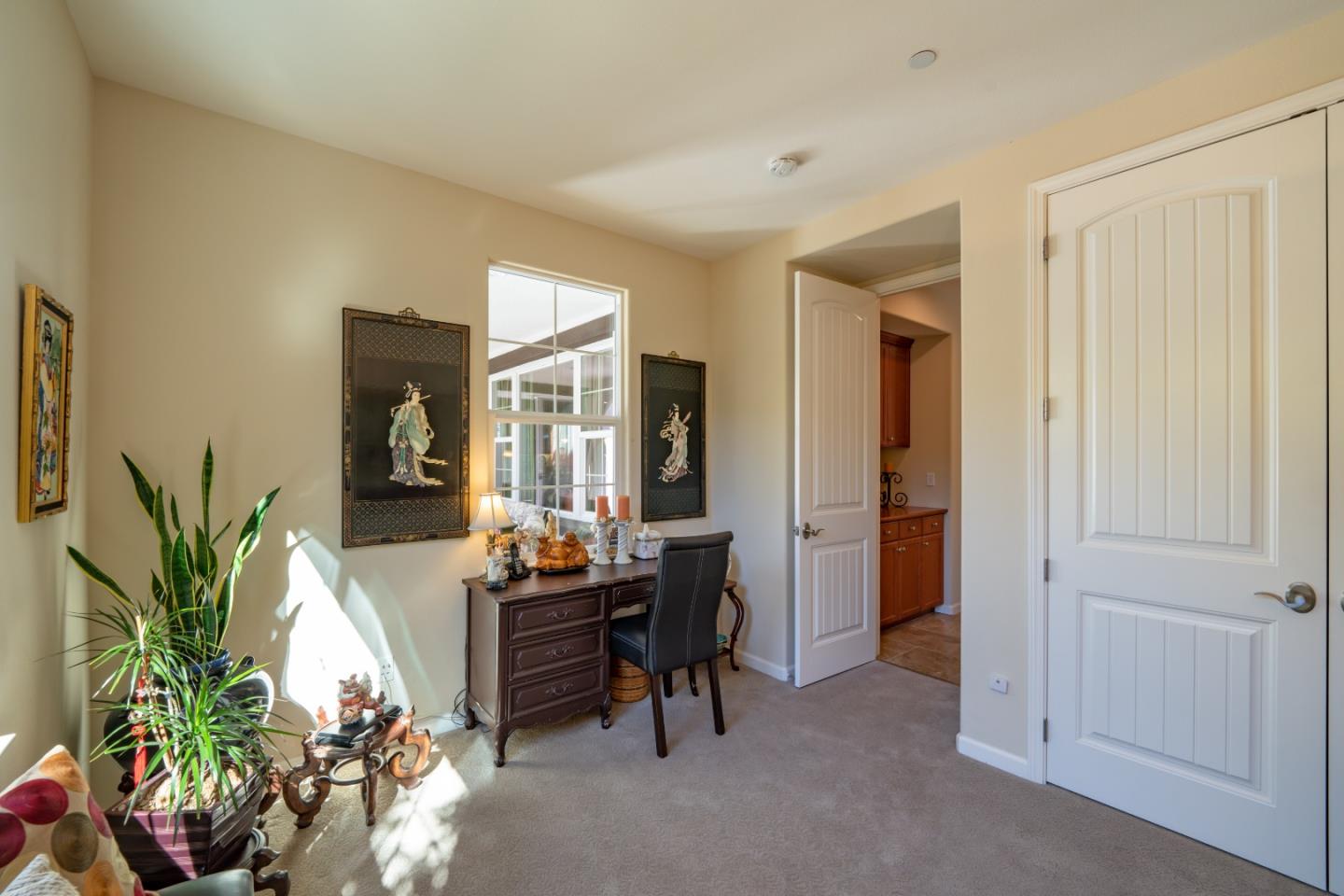 7683 Braid Court Gilroy, CA 95020 - Photo 27 of 69 a living room with furniture a potted plant and a large window