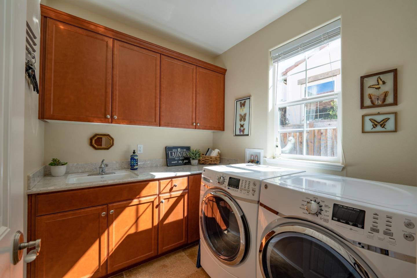 7683 Braid Court Gilroy, CA 95020 - Photo 29 of 69 a utility room with sink dryer and washer