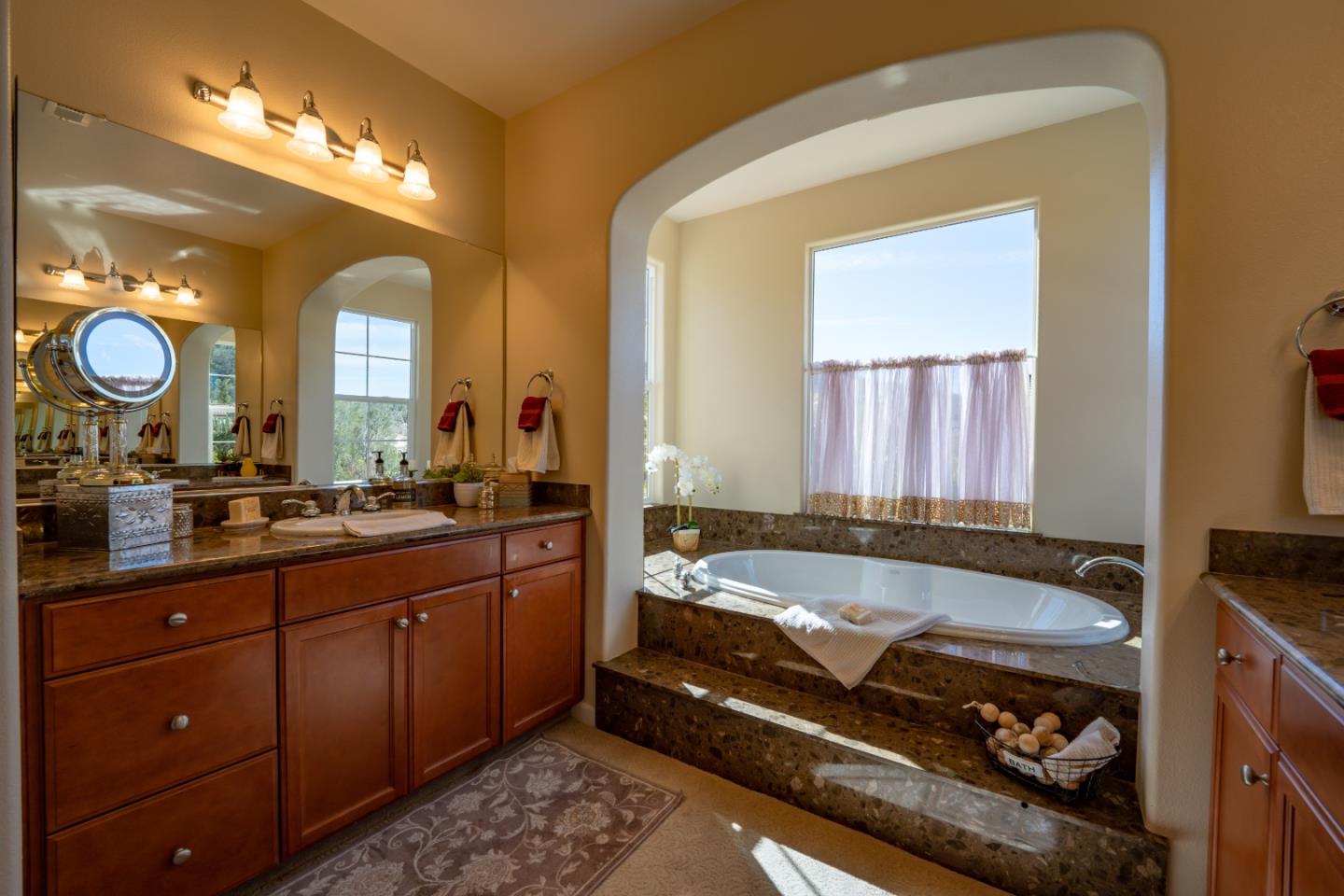 7683 Braid Court Gilroy, CA 95020 - Photo 49 of 69 a large bathroom with a large tub and sink
