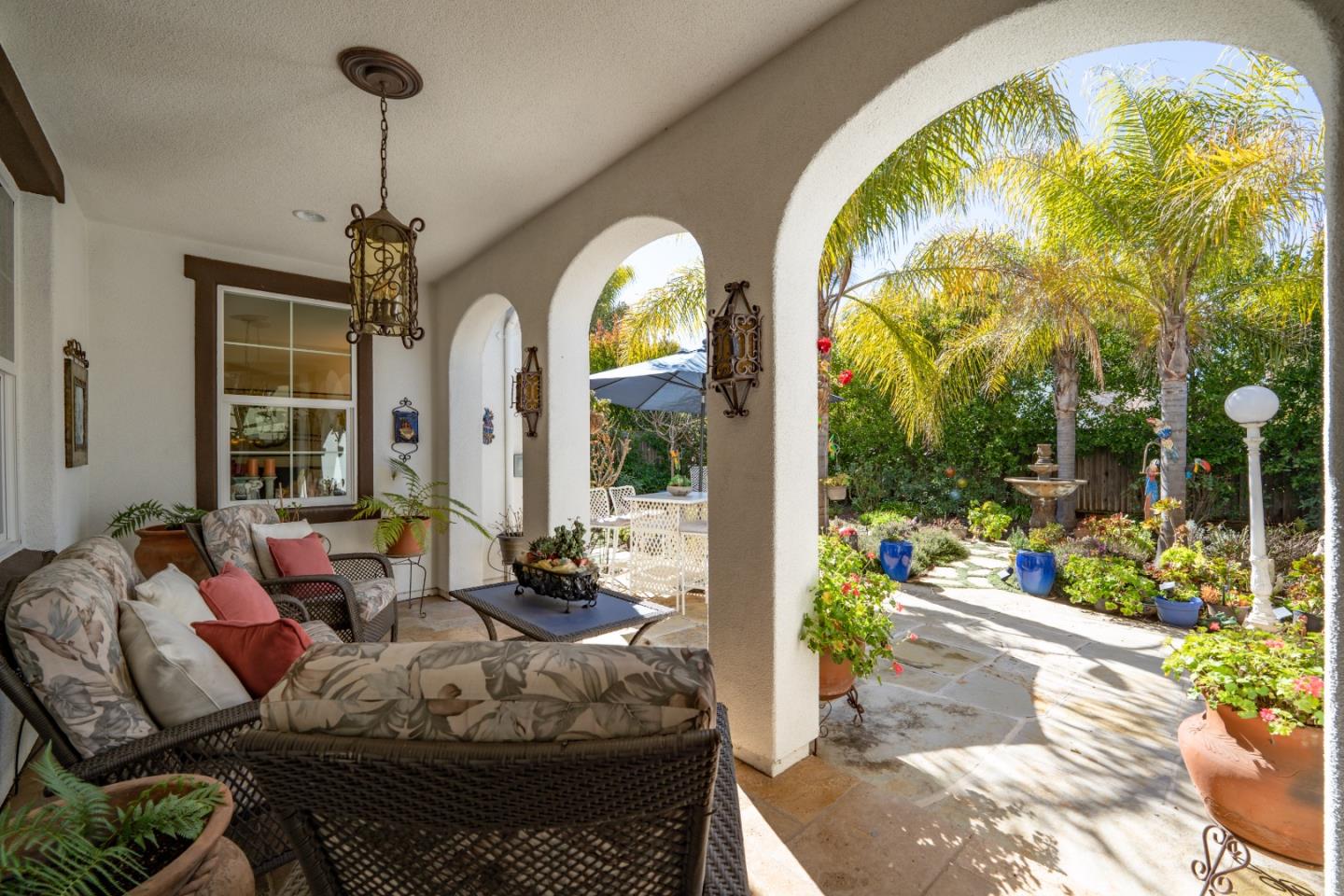 7683 Braid Court Gilroy, CA 95020 - Photo 55 of 69 a living room with furniture and a chandelier