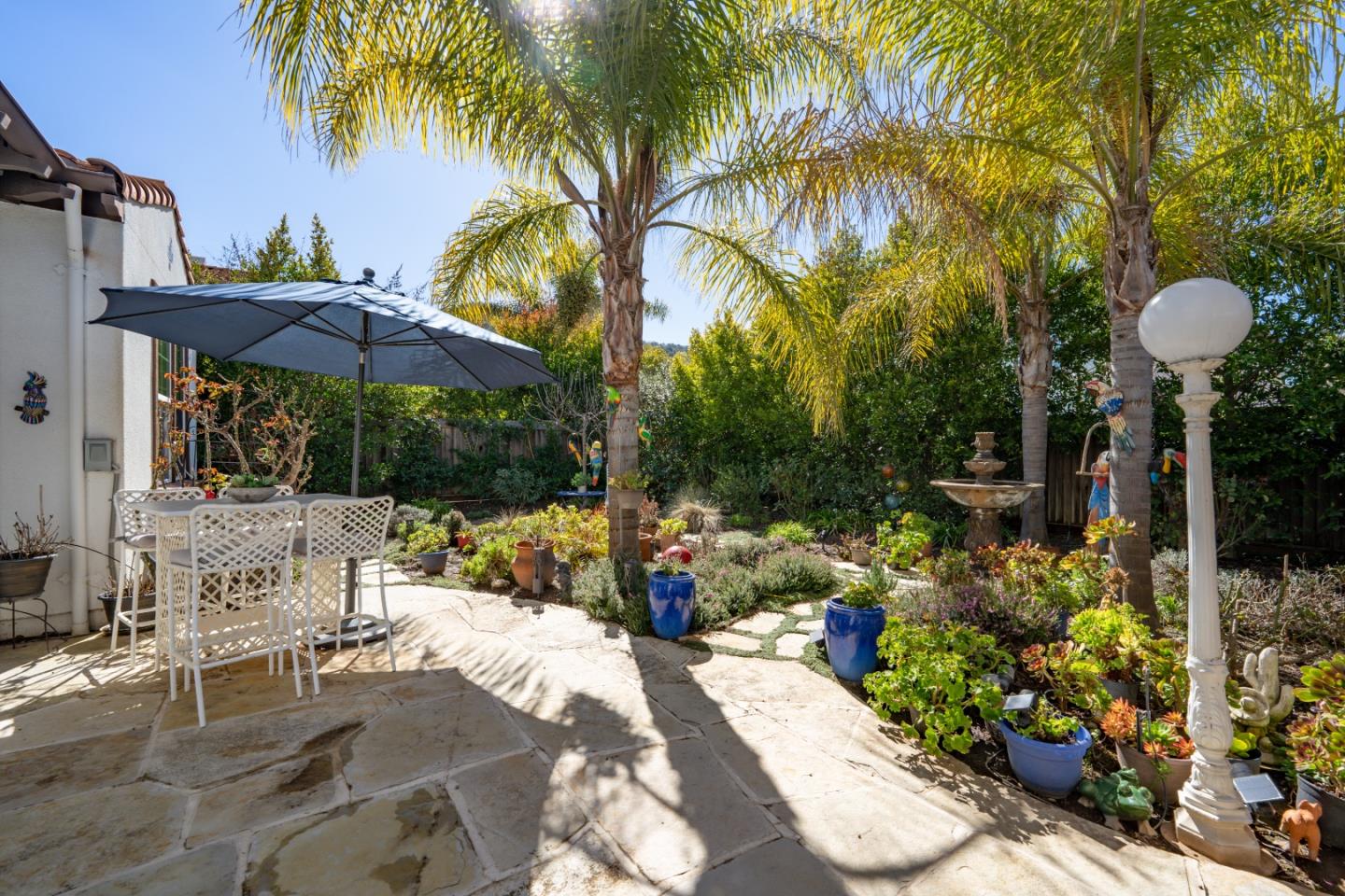 7683 Braid Court Gilroy, CA 95020 - Photo 59 of 69 a view of a table and chairs under an umbrella