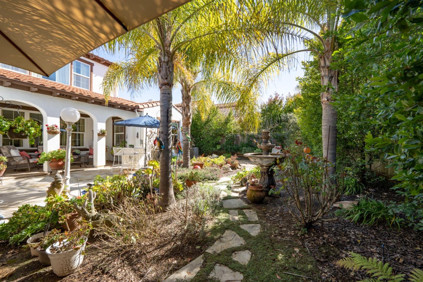 7683 Braid Court Gilroy, CA 95020 - Photo 65 of 69 a view of a yard with plants and a chair