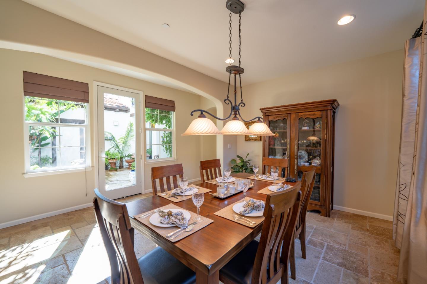 7683 Braid Court Gilroy, CA 95020 - Photo 10 of 69 a dining room with furniture a chandelier and wooden floor