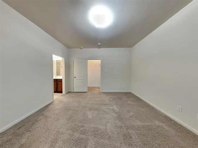an empty room with an entryway