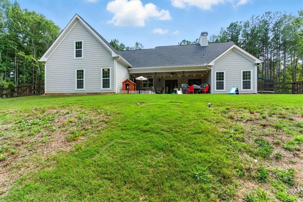 62 Joe Rowell Road Buchanan, GA 30113 - Photo 54 of 63 a view of a house with backyard and garden