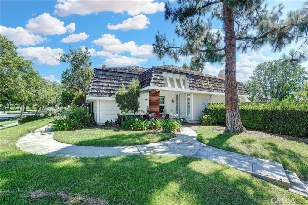 100 East Yale Loop Irvine, CA 92604 - Photo 1 of 1 a front view of a house with a yard
