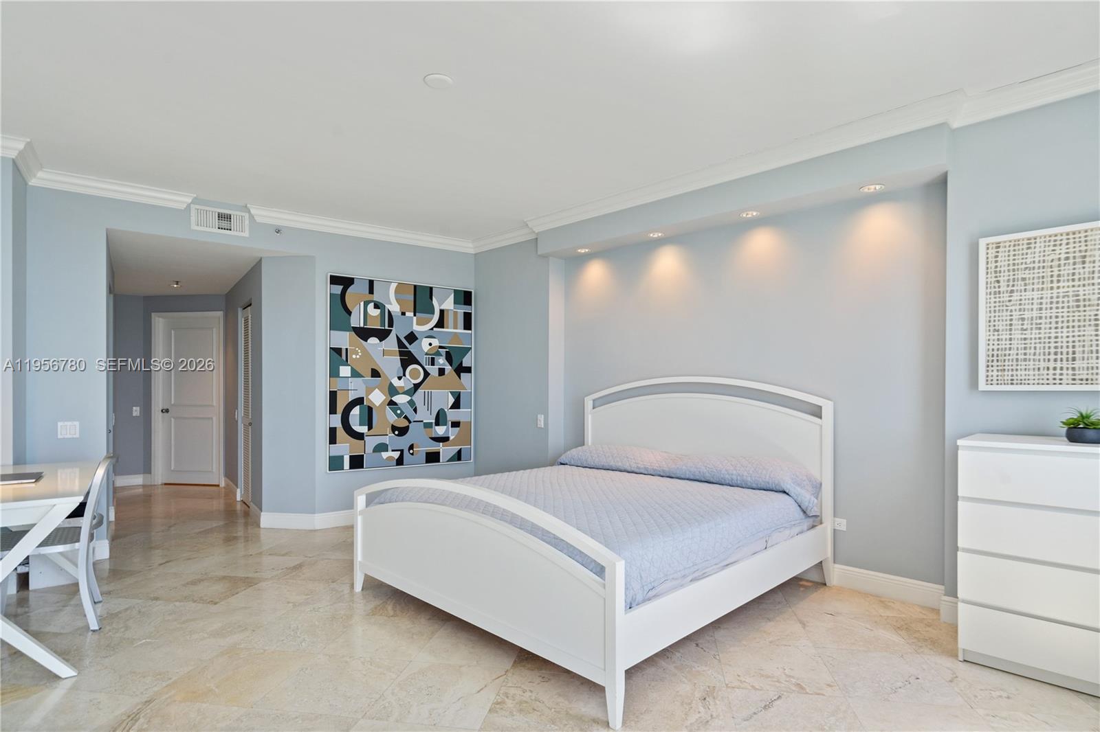 808 Brickell Key Drive, Unit 3304 Miami, FL 33131 - Photo 14 of 60 a bedroom with a large bed and a window