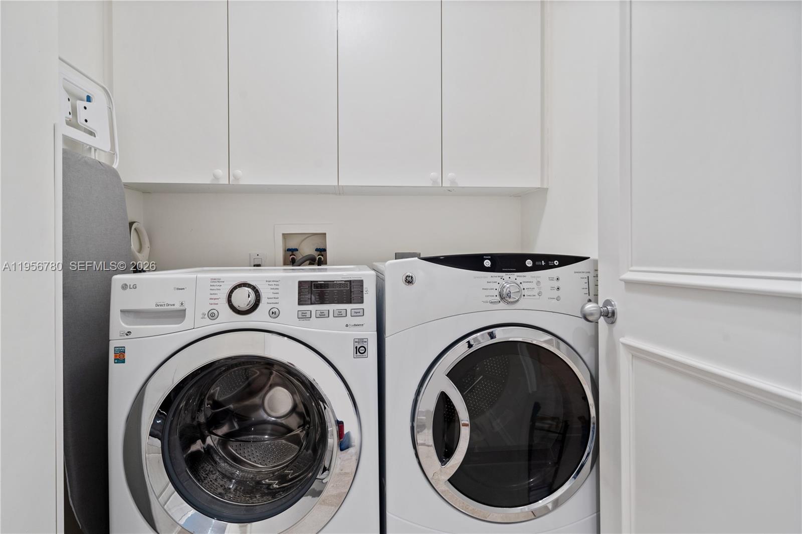 808 Brickell Key Drive, Unit 3304 Miami, FL 33131 - Photo 23 of 60 a view of entryway with washer and dryer