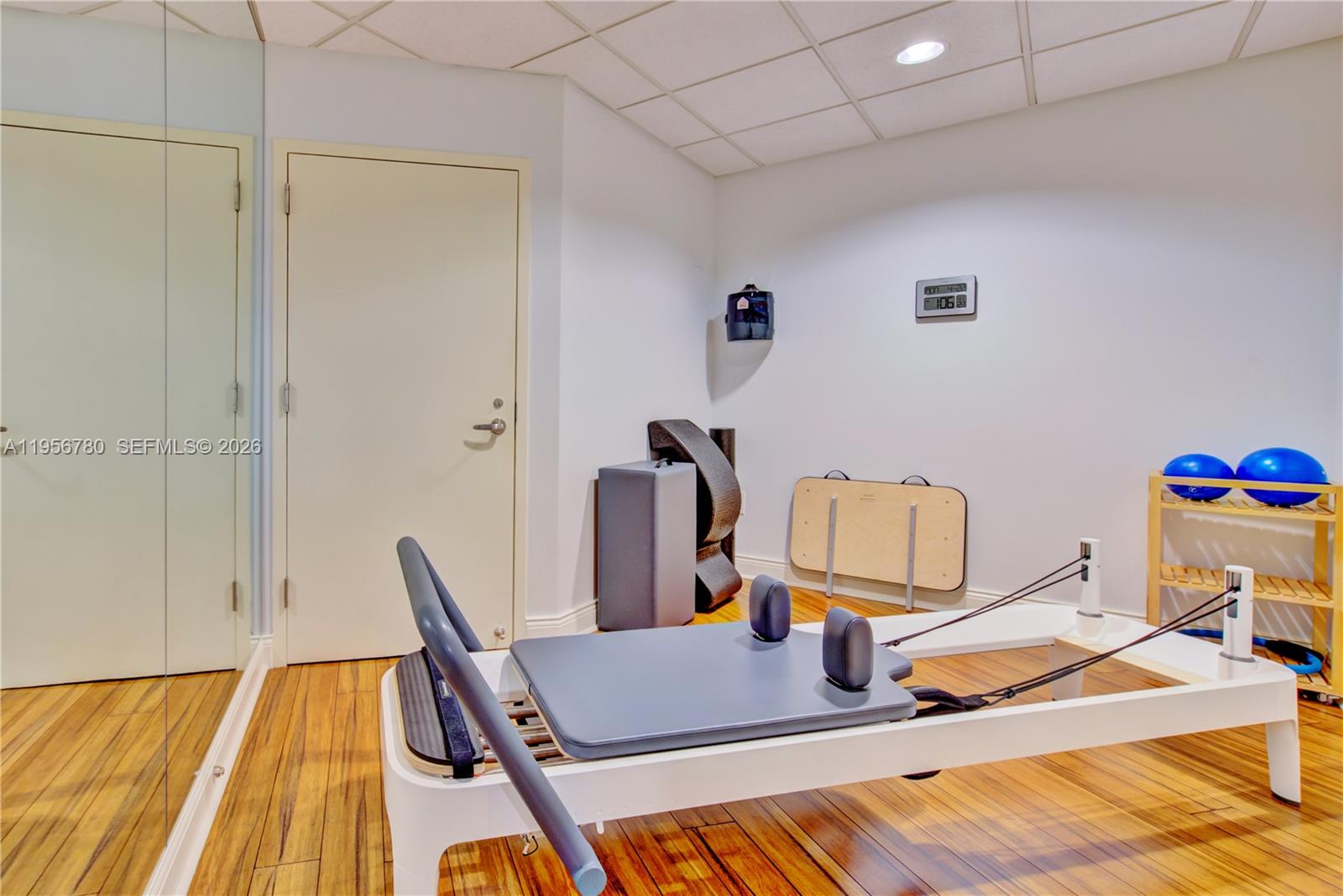 808 Brickell Key Drive, Unit 3304 Miami, FL 33131 - Photo 50 of 60 a room with furniture and wooden floor