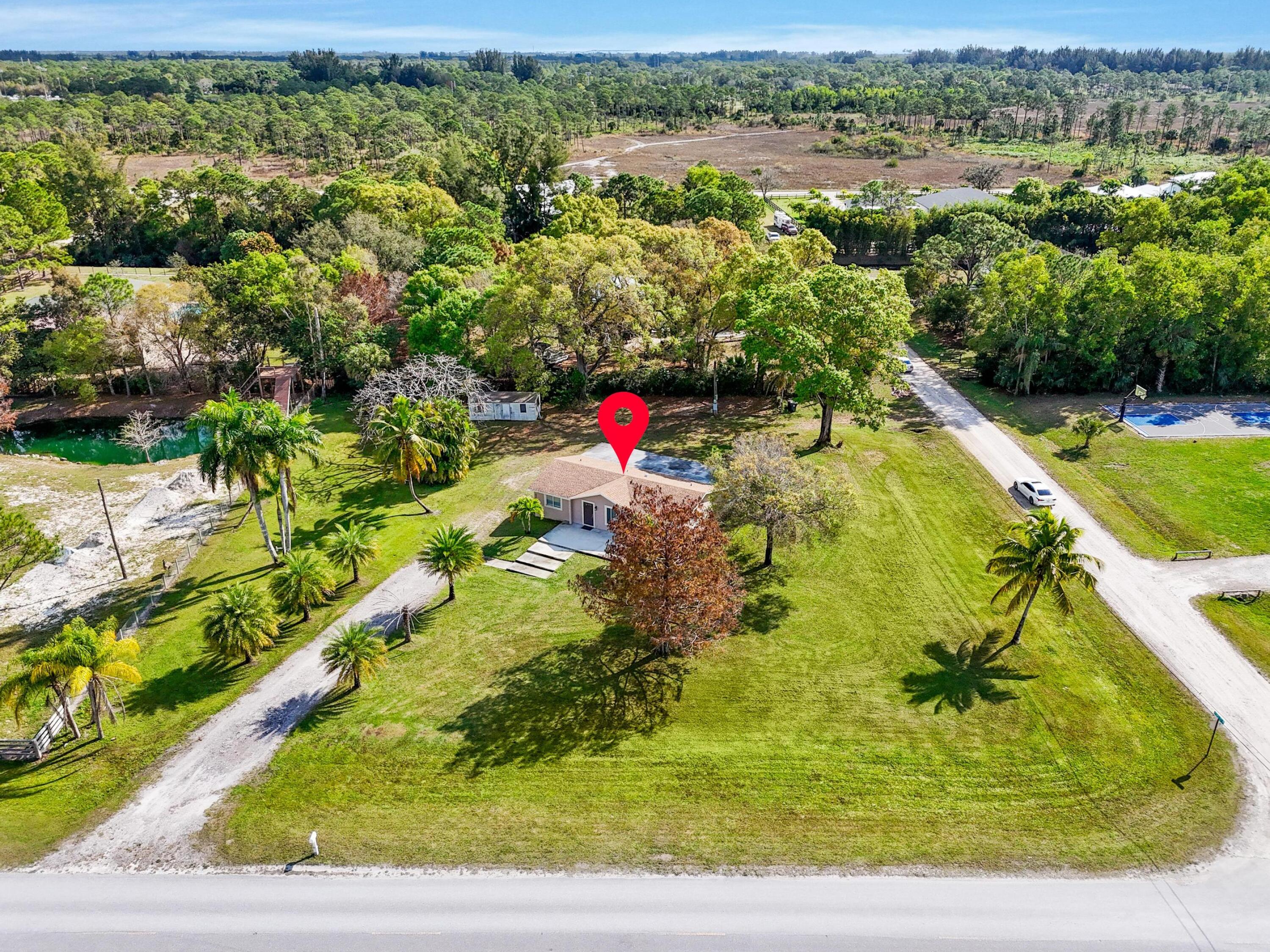 6344 Grapeview Boulevard Loxahatchee, FL 33470 - Photo 31 of 37 DJI_20250204104925_0411_D-Edit