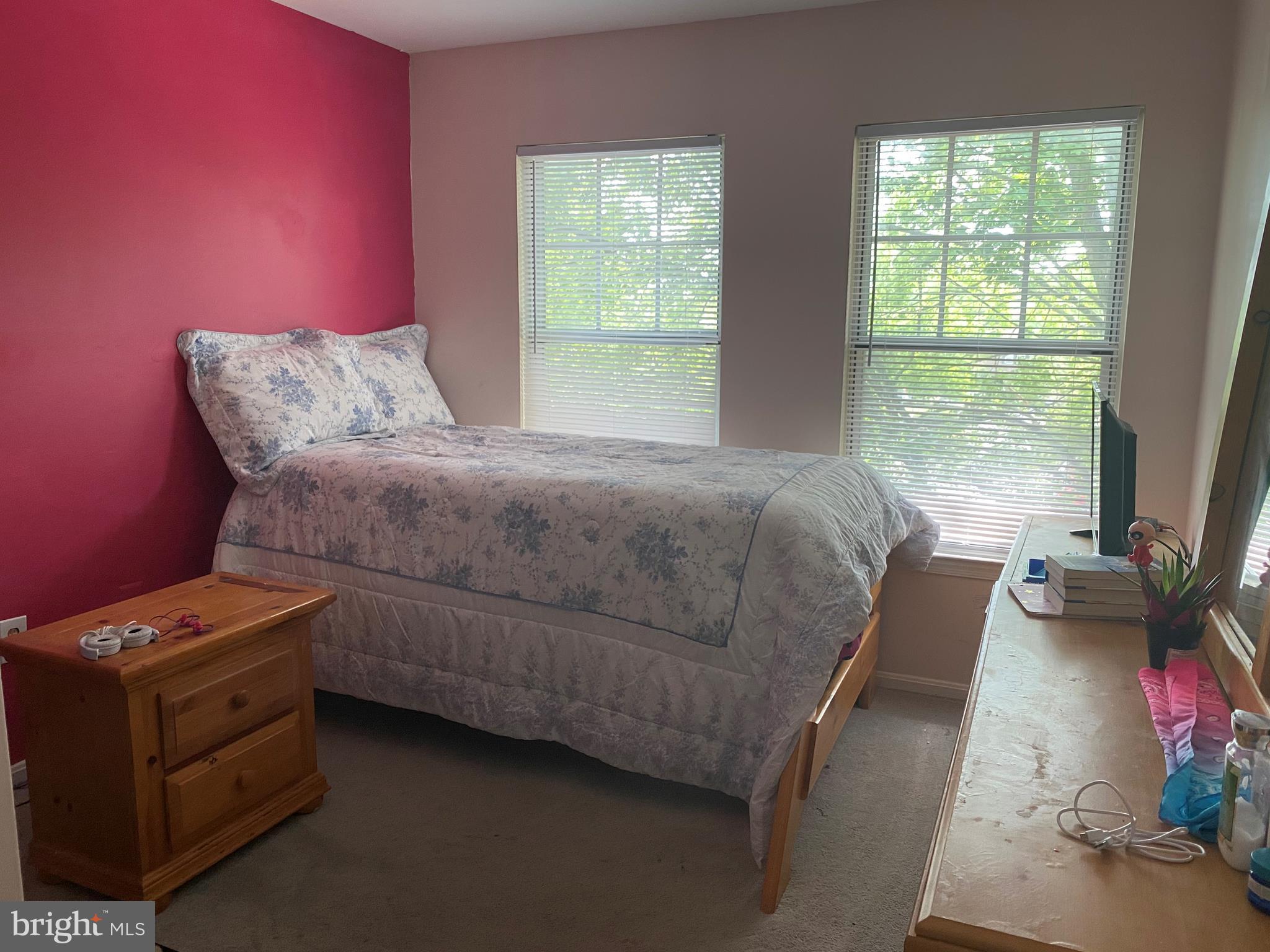 14526 Banquo Terrace, Unit 72 Silver Spring, MD 20906 - Photo 18 of 24 a living room with furniture and a window