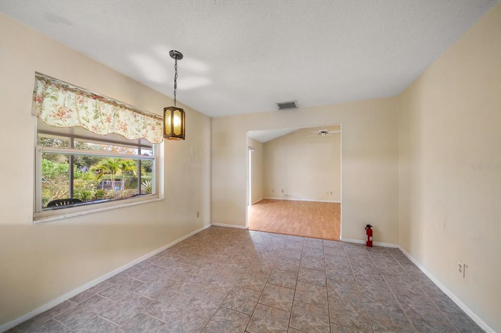 2850 Spring Lake Drive Clearwater, FL 33759 - Photo 13 of 37 a view of an empty room with a window