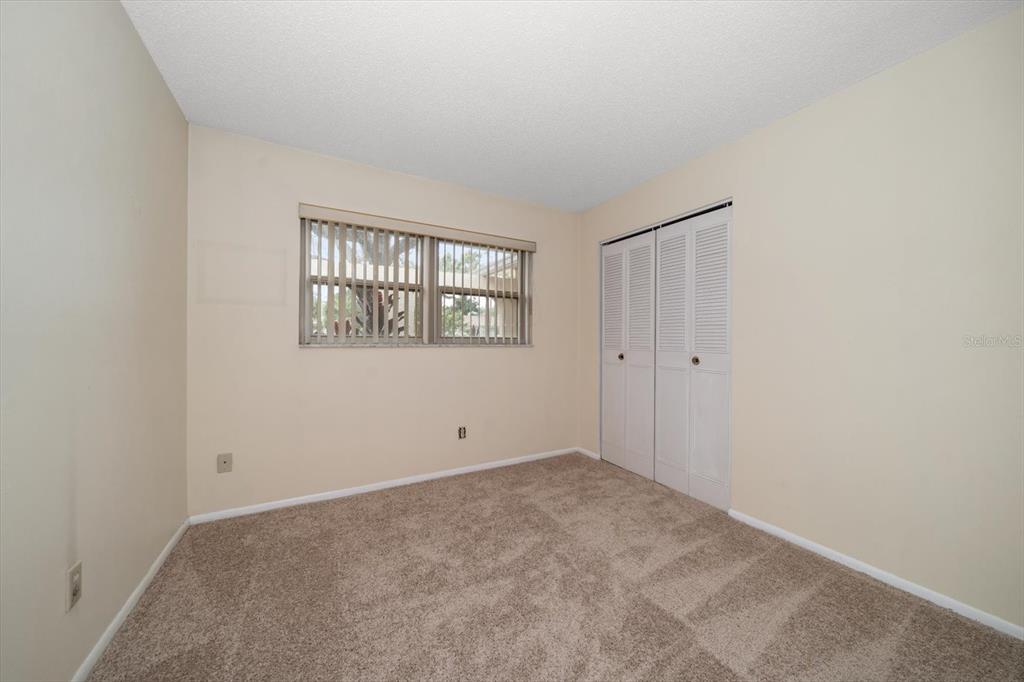 2850 Spring Lake Drive Clearwater, FL 33759 - Photo 19 of 37 a view of an empty room with a window