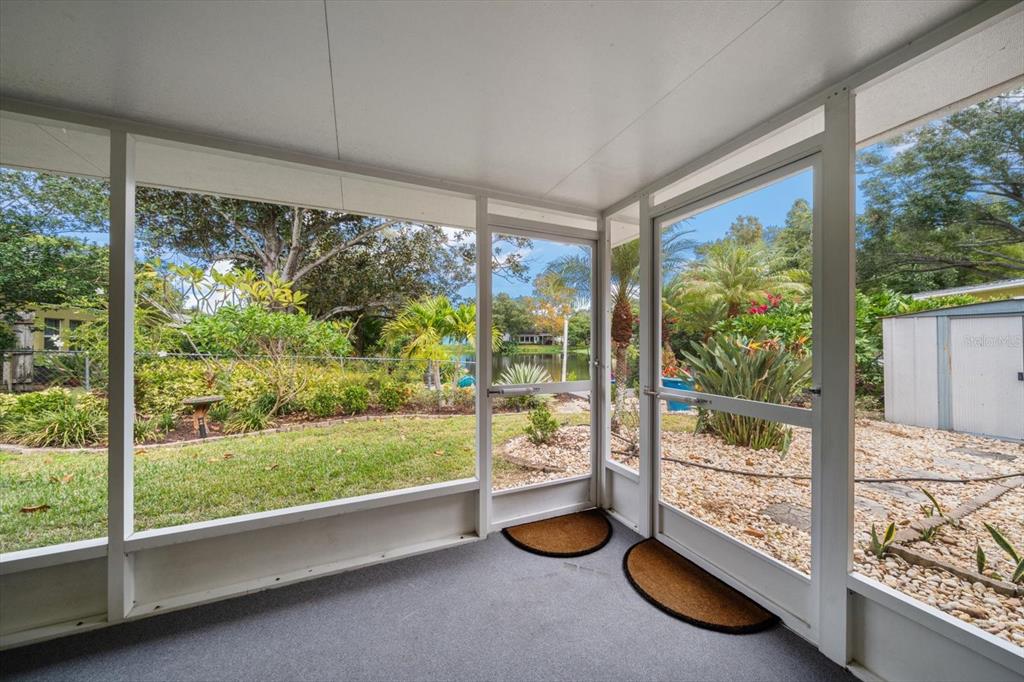 2850 Spring Lake Drive Clearwater, FL 33759 - Photo 23 of 37 a room with large windows