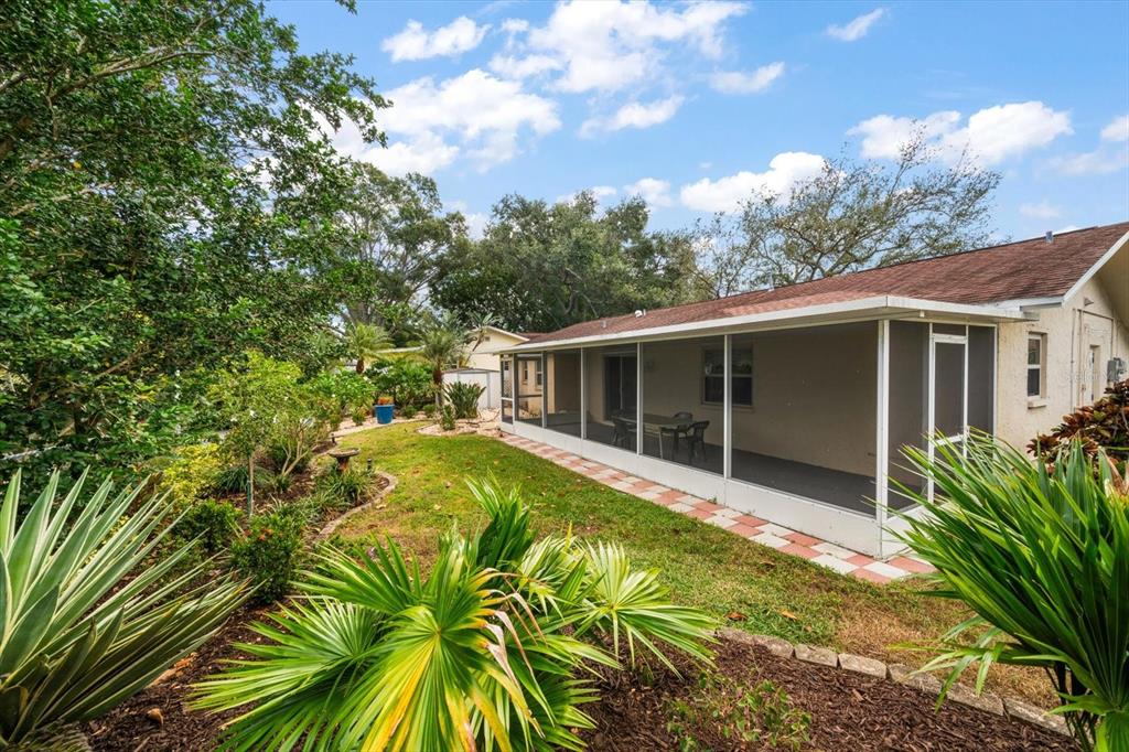 2850 Spring Lake Drive Clearwater, FL 33759 - Photo 29 of 37 a view of a house with a yard