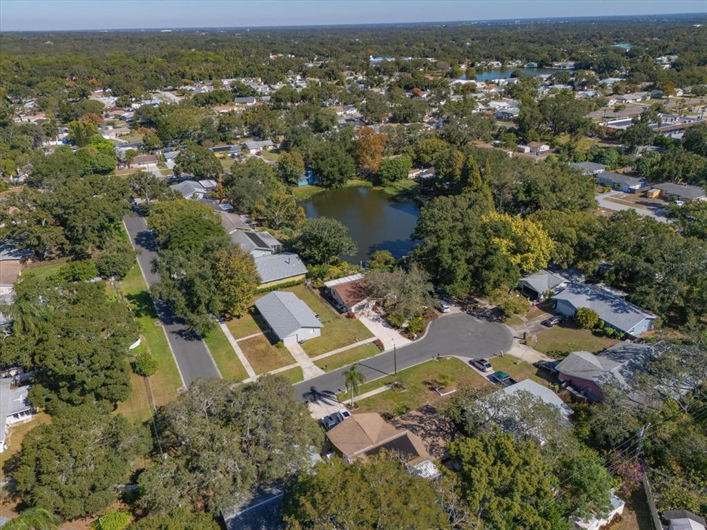 2850 Spring Lake Drive Clearwater, FL 33759 - Photo 30 of 37 an aerial view of residential houses with outdoor space and river