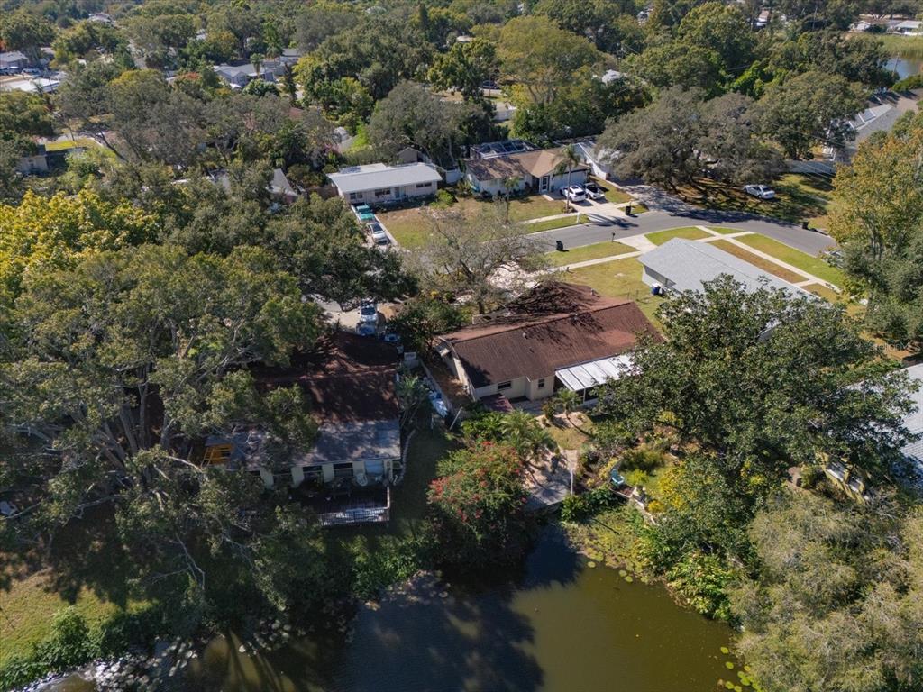 2850 Spring Lake Drive Clearwater, FL 33759 - Photo 31 of 37 an aerial view of residential house with outdoor space and lake view