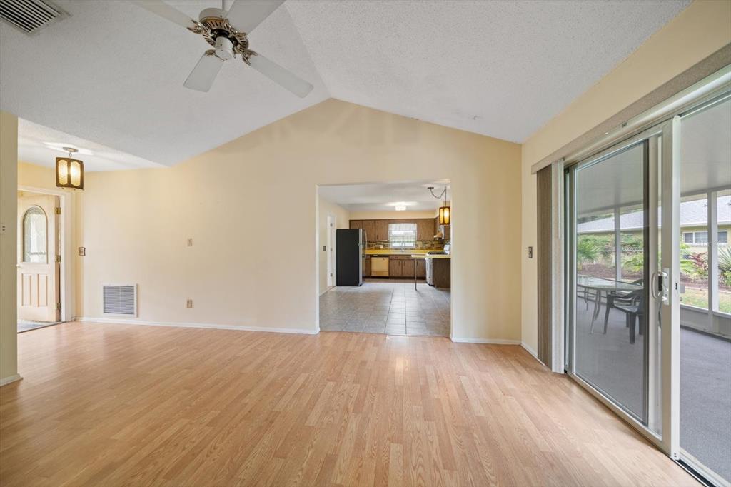 2850 Spring Lake Drive Clearwater, FL 33759 - Photo 9 of 37 a view of empty room with wooden floor and fan