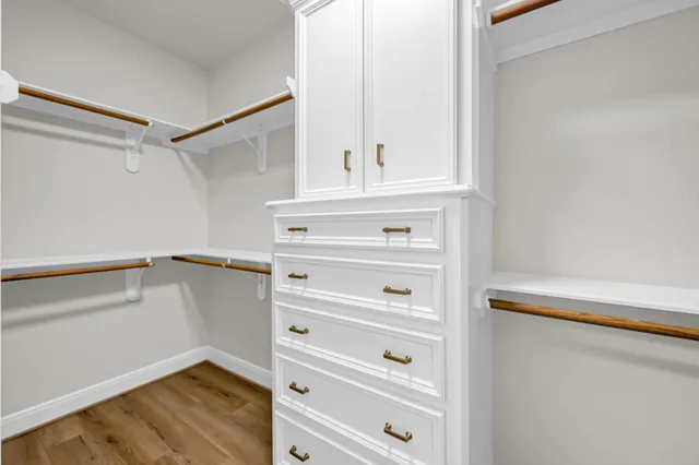 a view of an empty walk in closet