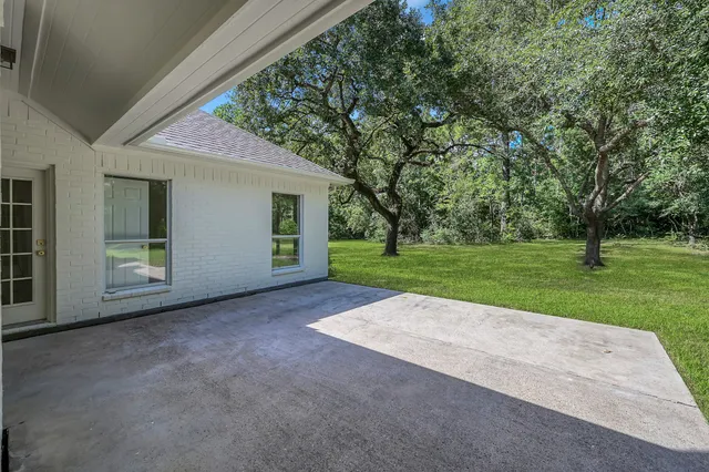 a view of a house with a big yard