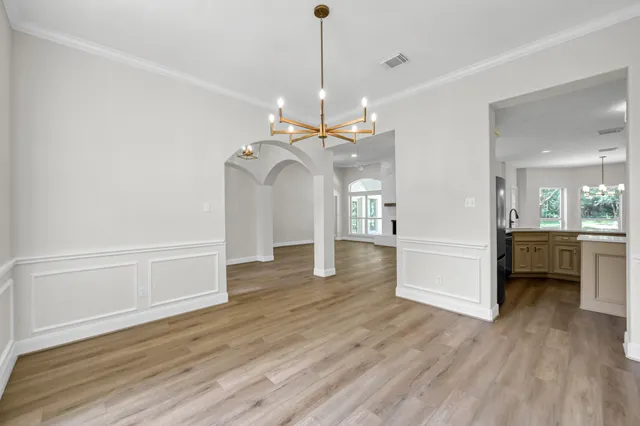 a view of a livingroom with wooden floor