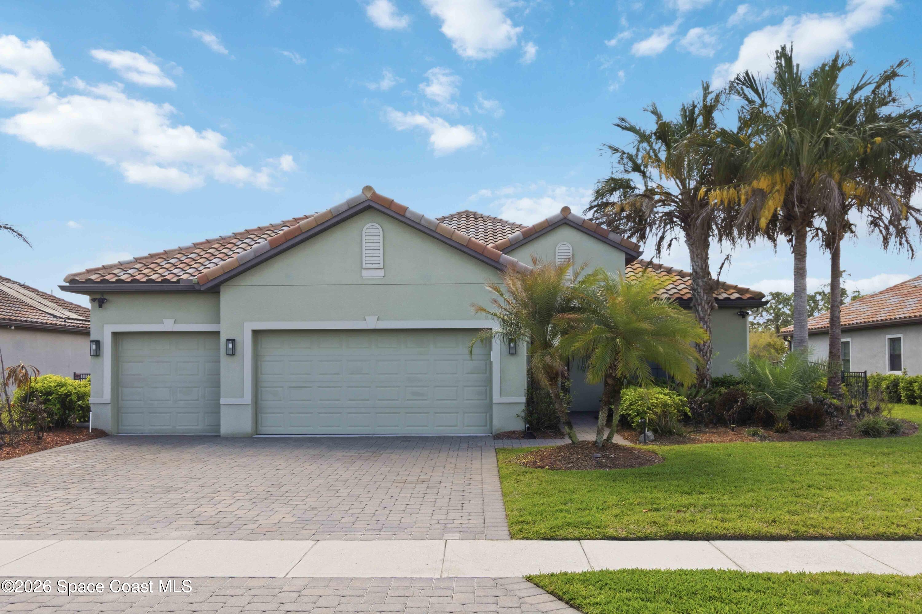 3333 Rushing Waters Drive West Melbourne, FL 32904 - Photo 1 of 72 Tile Roof