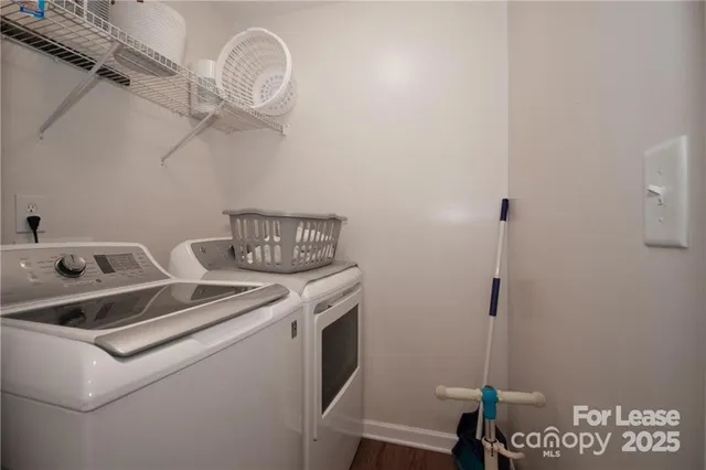 a utility room with dryer and washer