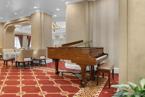 a view of a living room and dining room