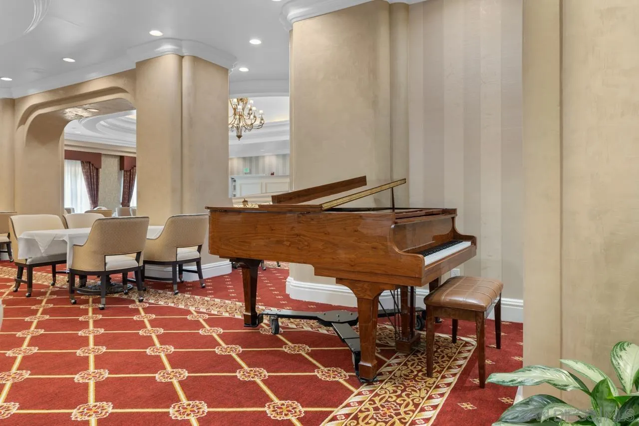 3890 Nobel, Unit 1205 San Diego, CA 92122 - Photo 17 of 19 a balcony with table and chairs