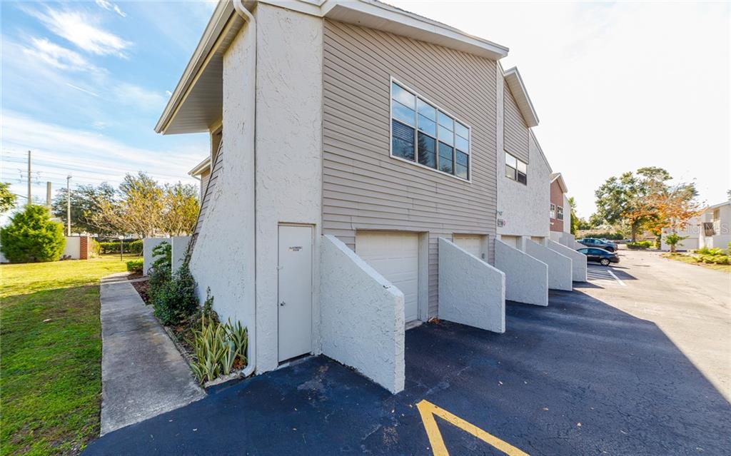 2798 Curry Ford Road, Unit C Orlando, FL 32806 - Photo 1 of 1 a view of a house with backyard and sitting area
