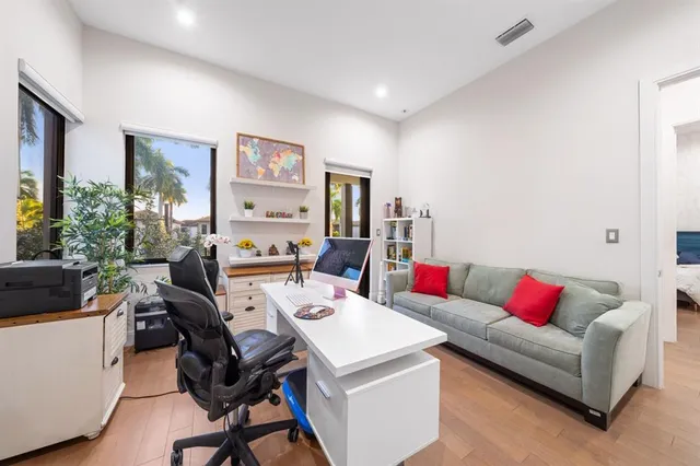 a view of a chairs and table in patio