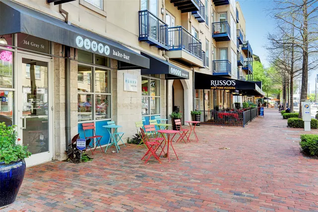 a view of a chairs and tables in the patio