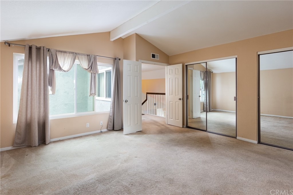 61 Sparrowhawk Irvine, CA 92604 - Photo 22 of 29 a view of empty room with large windows