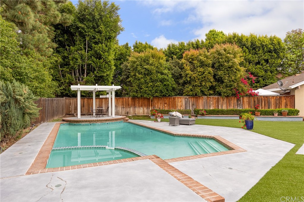 61 Sparrowhawk Irvine, CA 92604 - Photo 8 of 29 a view of a house with swimming pool and sitting area