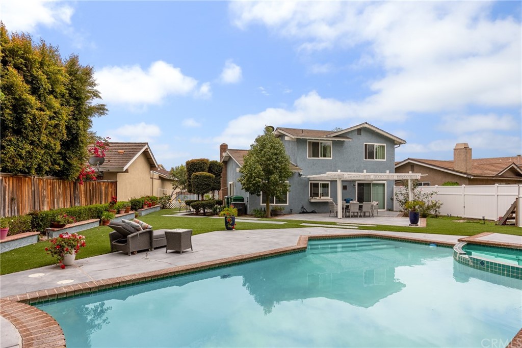 61 Sparrowhawk Irvine, CA 92604 - Photo 9 of 29 a view of a house with swimming pool and sitting area