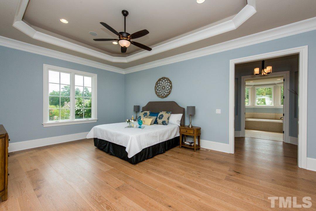 11005 Soco Gap Court Raleigh, NC 27613 - Photo 12 of 25 a living room with furniture and a large window
