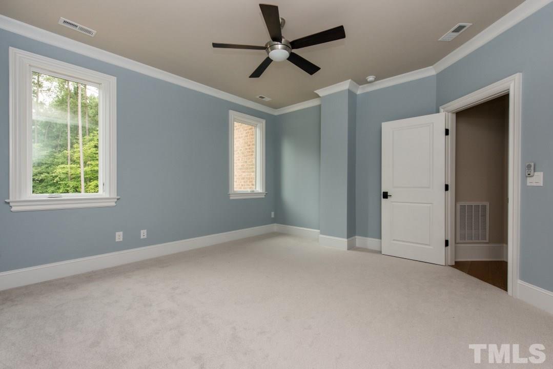 11005 Soco Gap Court Raleigh, NC 27613 - Photo 16 of 25 a view of an empty room with a window