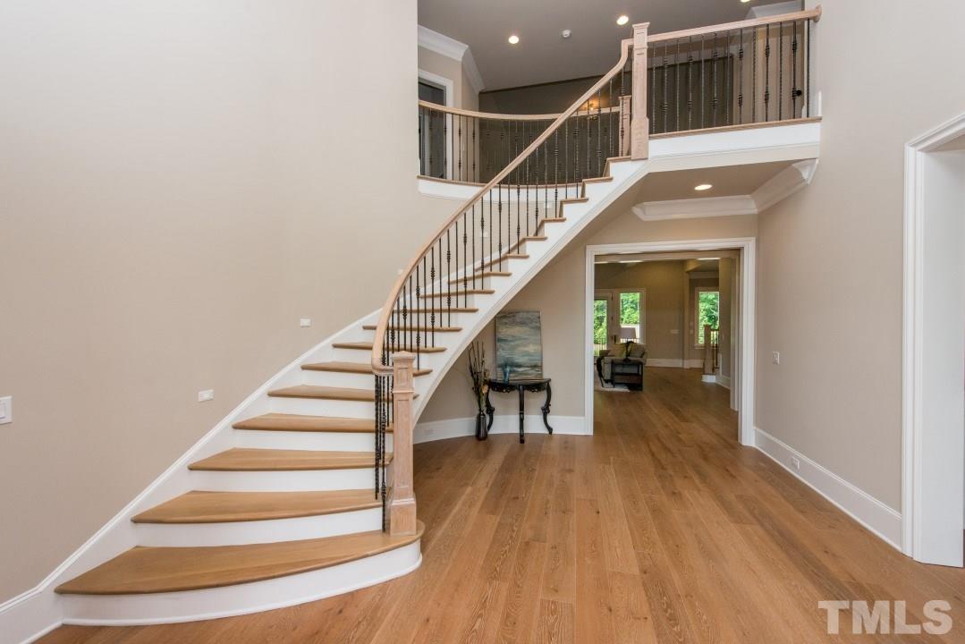 11005 Soco Gap Court Raleigh, NC 27613 - Photo 3 of 25 a view of entryway and hall with wooden floor
