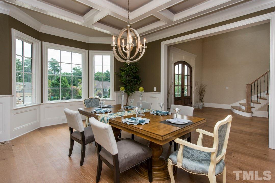 11005 Soco Gap Court Raleigh, NC 27613 - Photo 5 of 25 a view of a dining room with furniture window and outside view