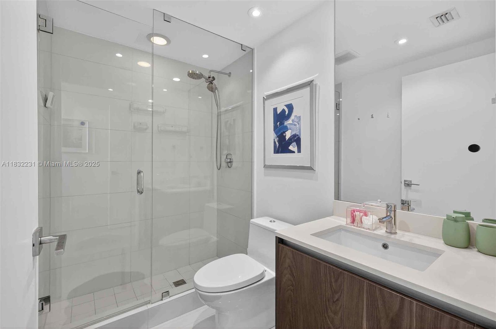 3131 Northeast 7th Avenue, Unit 4503 Miami, FL 33137 - Photo 28 of 51 a bathroom with a sink toilet and shower