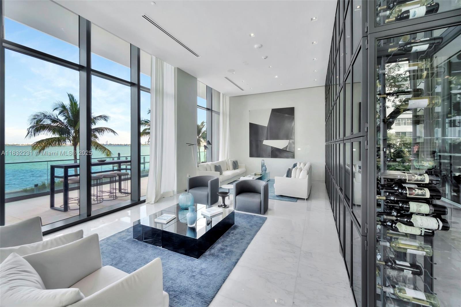 3131 Northeast 7th Avenue, Unit 4503 Miami, FL 33137 - Photo 34 of 51 a living room with furniture and a floor to ceiling window