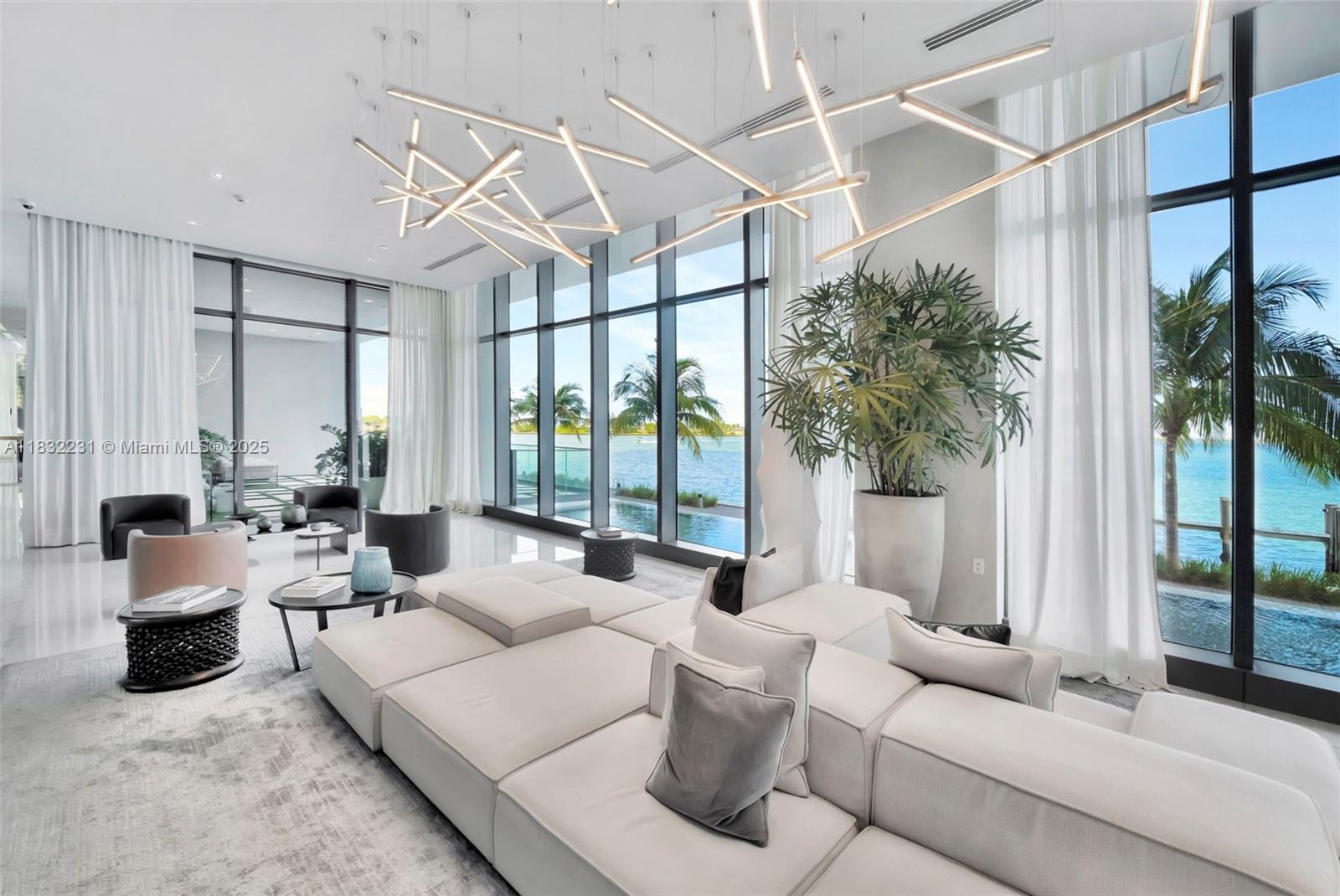 3131 Northeast 7th Avenue, Unit 4503 Miami, FL 33137 - Photo 38 of 51 a living room with furniture and a large window