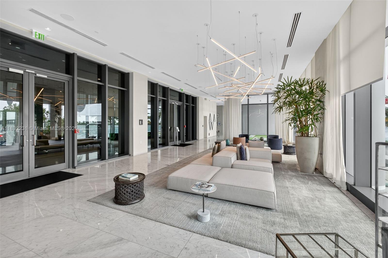 3131 Northeast 7th Avenue, Unit 4503 Miami, FL 33137 - Photo 50 of 51 a living room with furniture and large windows