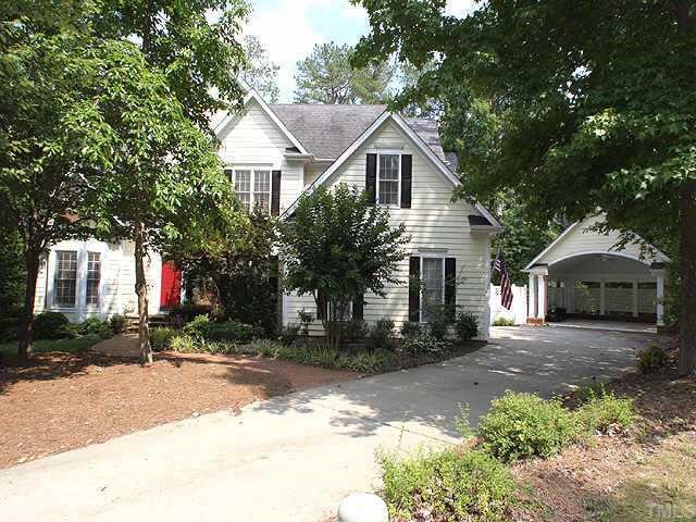2801 Leeds Place Raleigh, NC 27613 - Photo 1 of 1 a front view of a house with a yard and garage