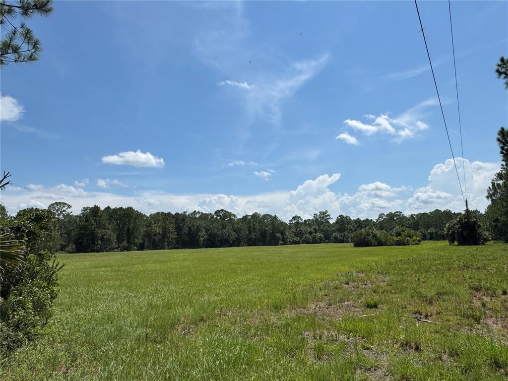 4300 Justa Road Mims, FL 32754 - Photo 24 of 61 a view of lake with green space