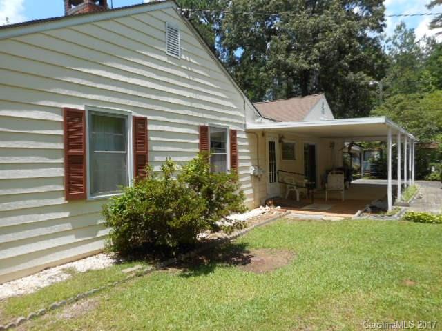 1007 Old Thompson Avenue Lancaster, SC 29720 - Photo 2 of 13 a view of a house with a yard and sitting area