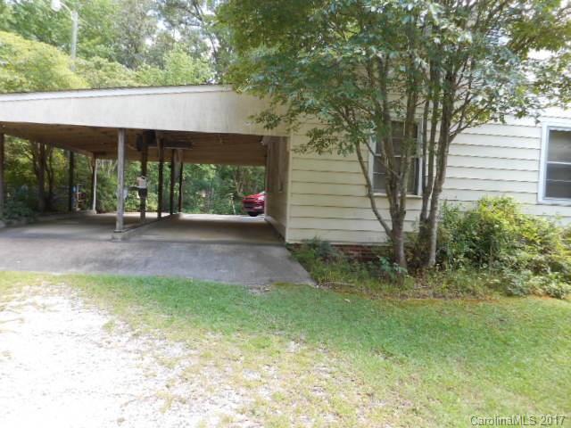 1007 Old Thompson Avenue Lancaster, SC 29720 - Photo 11 of 13 a view of a house with a yard and sitting area