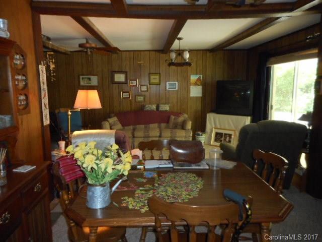 1007 Old Thompson Avenue Lancaster, SC 29720 - Photo 3 of 13 a dining room with furniture and wooden floor
